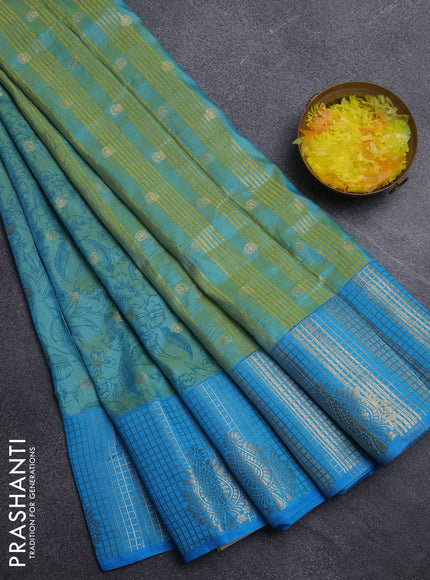 Semi raw silk saree dual shade of teal blue and cs blue with allover prints & 1000 buttas and zari checked butta border