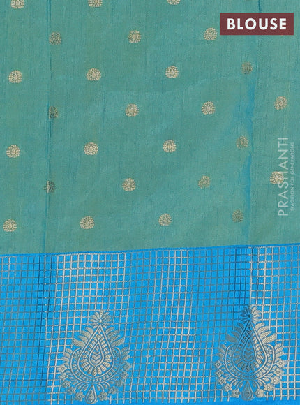 Semi raw silk saree dual shade of teal blue and cs blue with allover prints & 1000 buttas and zari checked butta border