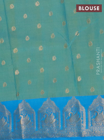 Semi raw silk saree dual shade of teal blue and cs blue with allover kalamkari prints & 1000 zari buttas and zari woven border