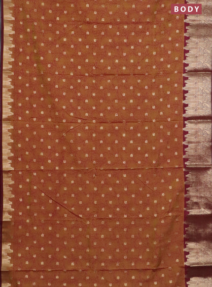 Semi raw silk saree dual shade of dark mustard and maroon with allover kalamkari prints & 1000 zari buttas and temple design zari woven border