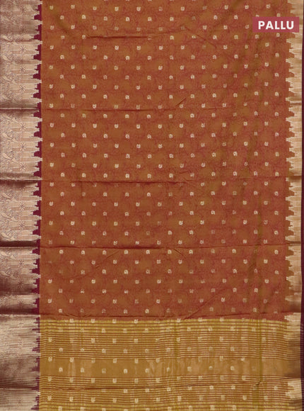 Semi raw silk saree dual shade of dark mustard and maroon with allover kalamkari prints & 1000 zari buttas and temple design zari woven border