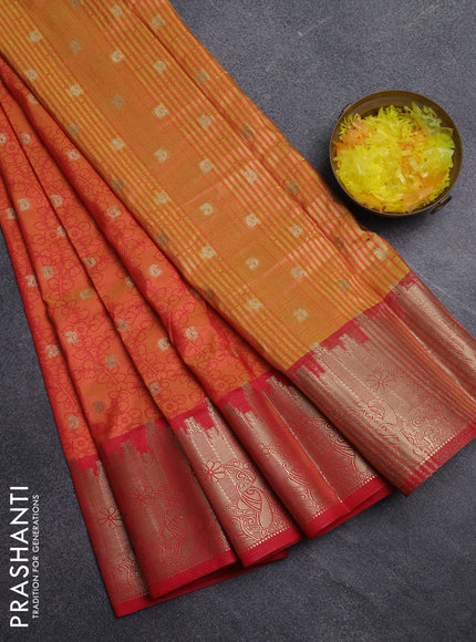 Semi raw silk saree dual shade of orange and red with allover kalamkari prints & 1000 zari buttas and temple design zari woven border