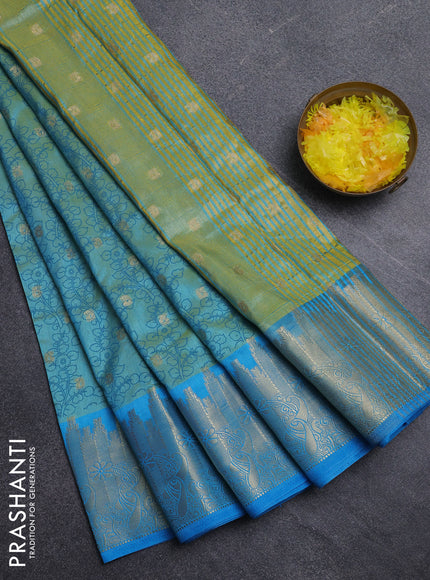 Semi raw silk saree dual shade of teal blue and cs blue with allover kalamkari prints & 1000 zari buttas and temple design zari woven border