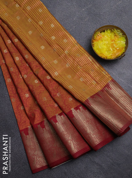 Semi raw silk saree dark mustard and maroon with allover kalamkari prints & 1000 zari buttas and temple design zari woven border