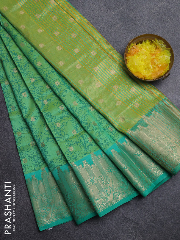 Semi raw silk saree dual shade of light gren and teal green with allover kalamkari prints & 1000 zari buttas and temple design zari woven border