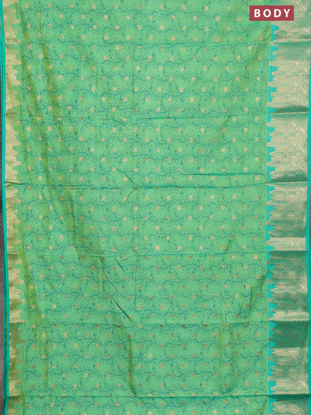 Semi raw silk saree dual shade of light gren and teal green with allover kalamkari prints & 1000 zari buttas and temple design zari woven border