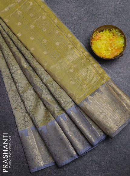 Semi raw silk saree elaichi green and grey with allover kalamkari prints & 1000 zari buttas and temple design zari woven border