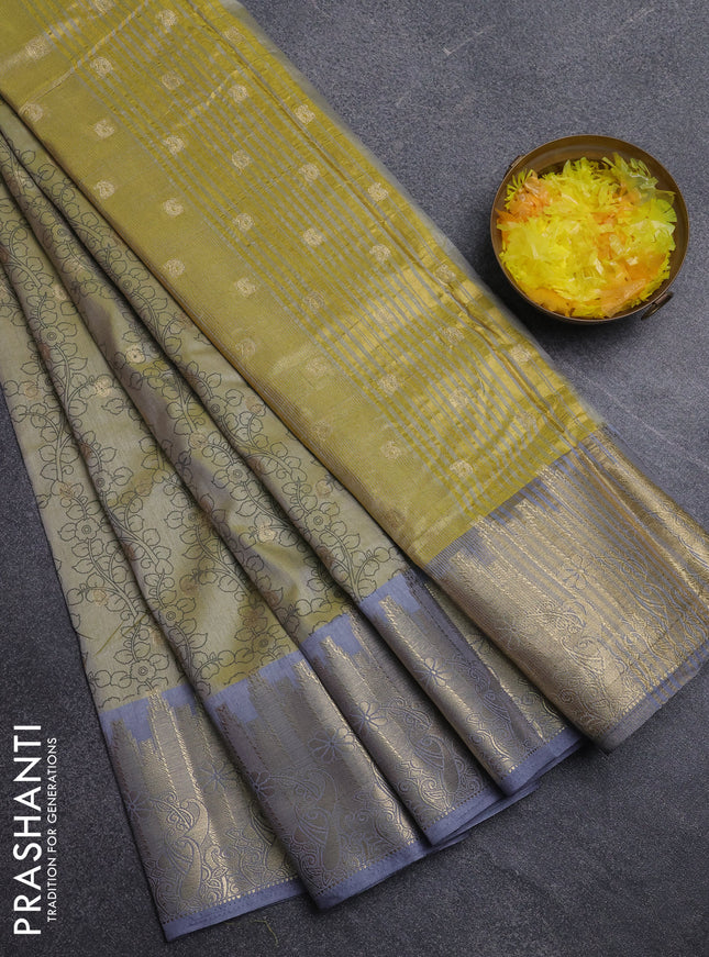 Semi raw silk saree elaichi green and grey with allover kalamkari prints & 1000 zari buttas and temple design zari woven border