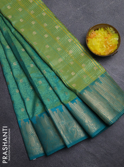 Semi raw silk saree dual shade of teal green and green with allover kalamkari prints & 1000 zari buttas and temple design zari woven border