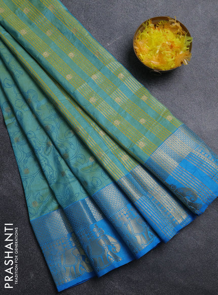 Semi raw silk saree teal bluish green and cs blue with allover kalamkari prints & 1000 zari buttas and zari woven elephant butta border