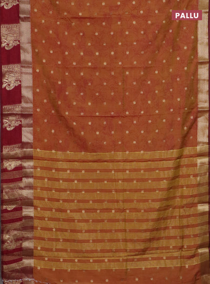 Semi raw silk saree dark mustard and maroon with allover kalamkari prints & 1000 zari buttas and zari woven elephant butta border