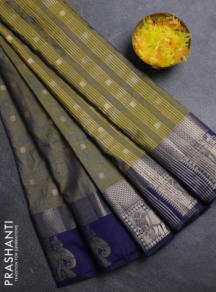 Semi raw silk saree mehendi green and navy blue with allover kalamkari prints & 1000 zari buttas and zari woven elephant butta border