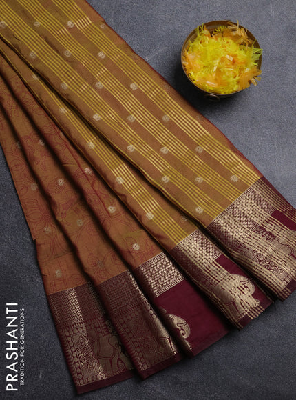 Semi raw silk saree dark mustard and wine shade with allover kalamkari prints & 1000 zari buttas and zari woven elephant butta border