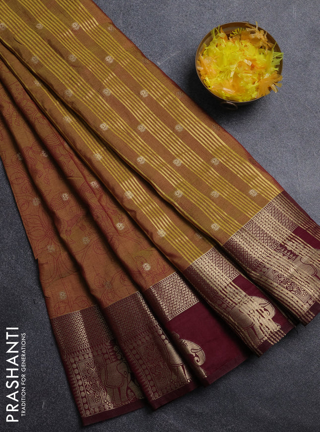 Semi raw silk saree dark mustard and wine shade with allover kalamkari prints & 1000 zari buttas and zari woven elephant butta border