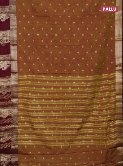 Semi raw silk saree dark mustard and wine shade with allover kalamkari prints & 1000 zari buttas and zari woven elephant butta border