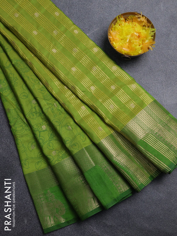 Semi raw silk saree light green and green with allover kalamkari prints & 1000 zari buttas and zari woven elephant butta border