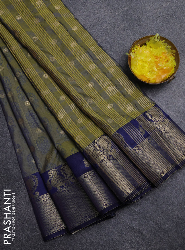 Semi raw silk saree dual shade of mehendi green and navy blue with allover butta prints & 1000 zari buttas and zari woven border