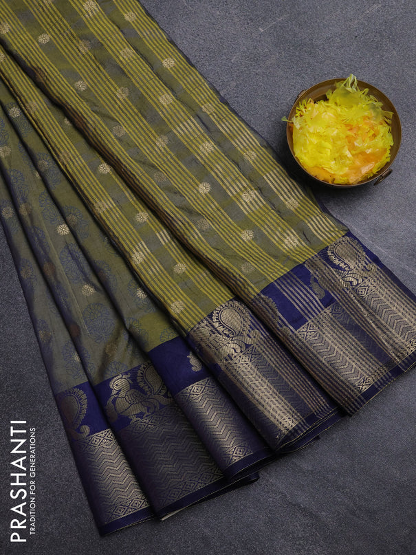 Semi raw silk saree dual shade of mehendi green and navy blue with allover butta prints & 1000 zari buttas and zari woven border