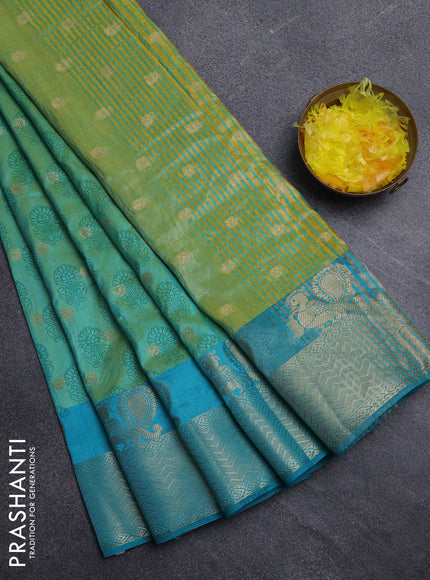Semi raw silk saree dual shade of teal bluish green and cs blue with allover butta prints & 1000 zari buttas and zari woven border