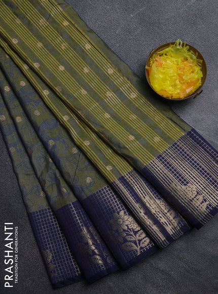 Semi raw silk saree mehendi green and navy blue with allover kalamkari prints & 1000 zari buttas and zari checked butta border