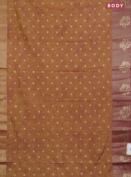 Semi raw silk saree dark mustard green and brown with allover kalamkari prints & 1000 zari buttas and zari checked butta border