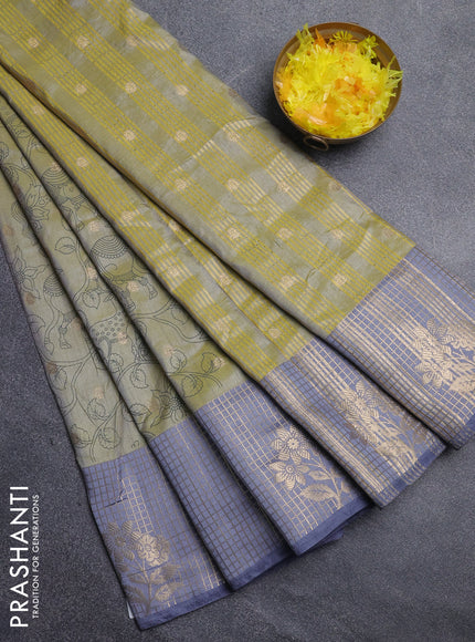 Semi raw silk saree pista green and grey with allover kalamkari prints & 1000 zari buttas and zari checked butta border