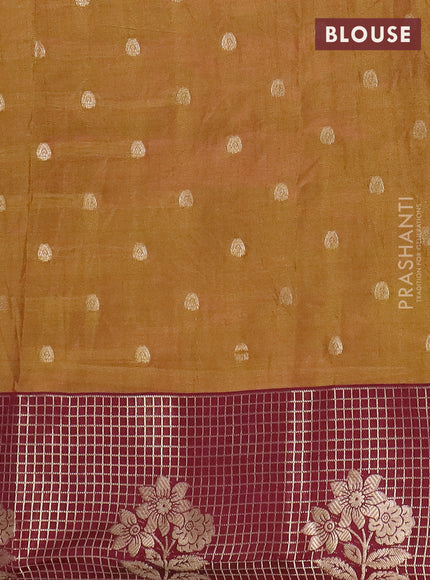 Semi raw silk saree lime green and deep maroon with allover kalamkari prints & 1000 zari buttas and zari checked butta border