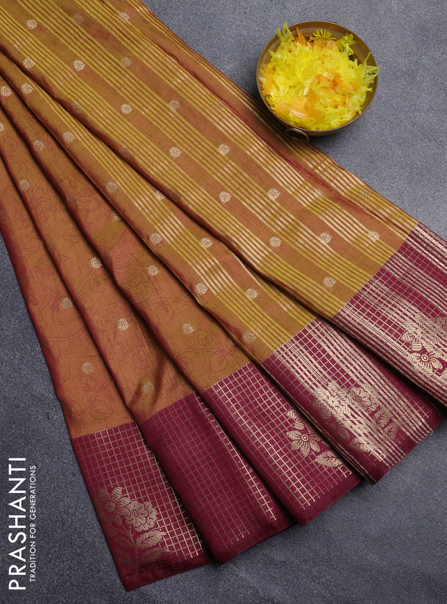 Semi raw silk saree dark mustard and maroon with allover kalamkari prints & 1000 zari buttas and zari checked butta border