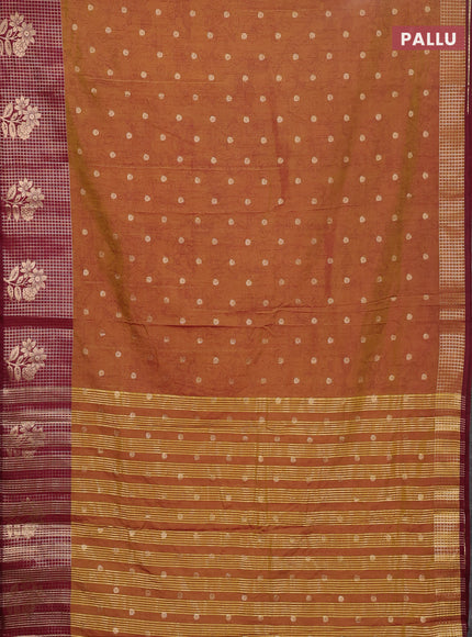 Semi raw silk saree dark mustard and maroon with allover kalamkari prints & 1000 zari buttas and zari checked butta border