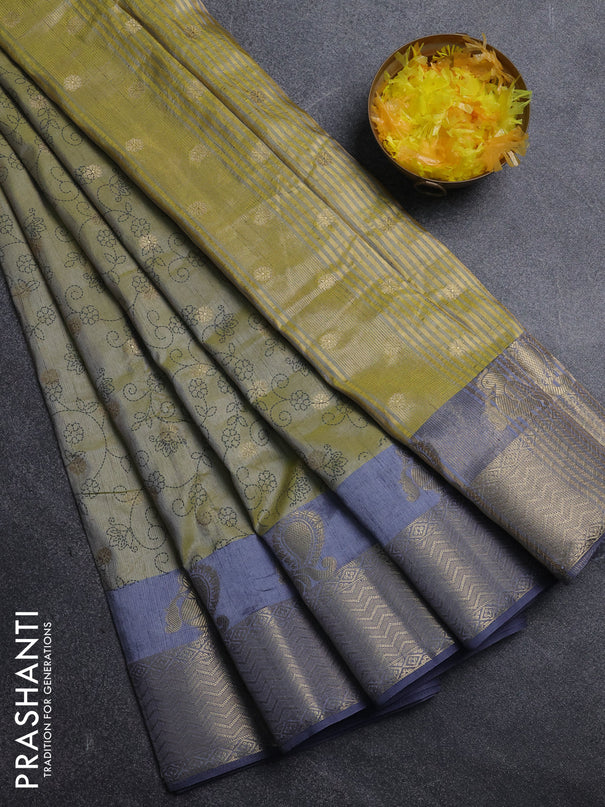 Semi raw silk saree elaichi green and grey with allover prints & 1000 zari buttas and annam zari woven border
