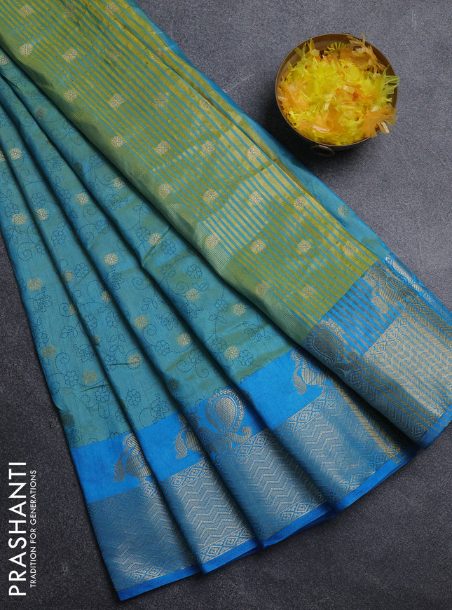 Semi raw silk saree dual shade of teal bluish green and cs blue with allover prints & 1000 zari buttas and annam zari woven border