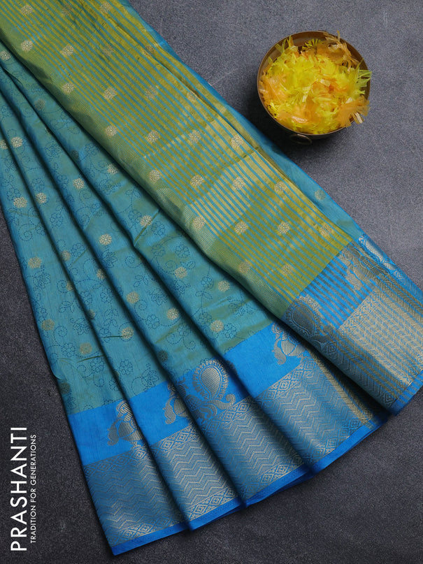 Semi raw silk saree dual shade of teal bluish green and cs blue with allover prints & 1000 zari buttas and annam zari woven border