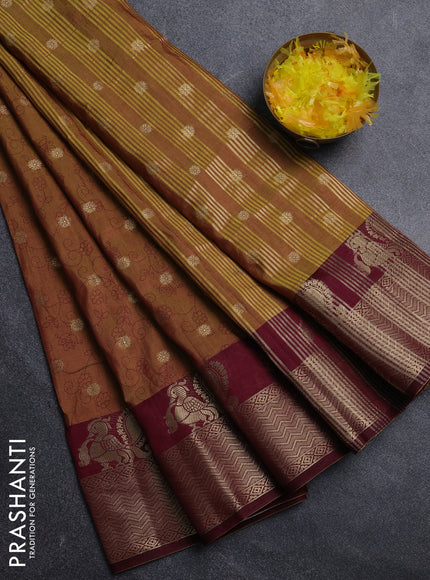 Semi raw silk saree dual shade of mustard green and wine shade with allover prints & 1000 zari buttas and annam zari woven border