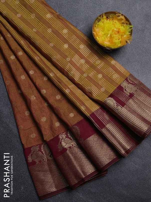 Semi raw silk saree dual shade of mustard green and wine shade with allover prints & 1000 zari buttas and annam zari woven border