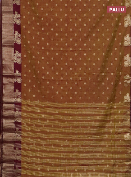 Semi raw silk saree dual shade of mustard green and wine shade with allover prints & 1000 zari buttas and annam zari woven border