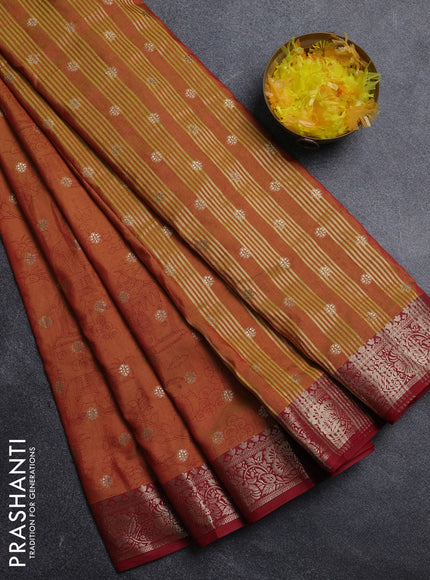 Semi raw silk saree dual shade of dark mustard and maroon with allover kalamkari prints & 1000 zari buttas and zari woven border