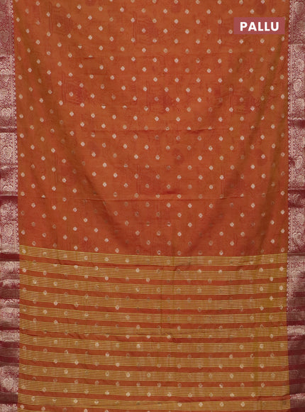 Semi raw silk saree dual shade of dark mustard and maroon with allover kalamkari prints & 1000 zari buttas and zari woven border