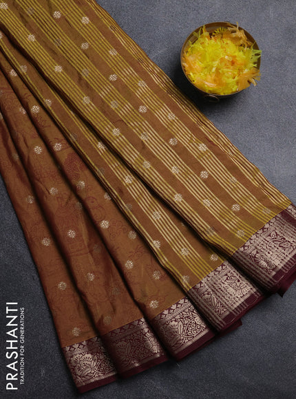 Semi raw silk saree dual shade of mustard green and wine shade with allover kalamkari prints & 1000 zari buttas and zari woven border