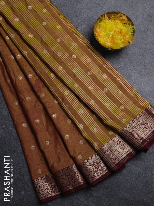 Semi raw silk saree dual shade of mustard green and wine shade with allover kalamkari prints & 1000 zari buttas and zari woven border