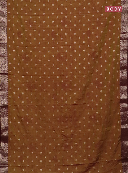 Semi raw silk saree dual shade of mustard green and wine shade with allover kalamkari prints & 1000 zari buttas and zari woven border