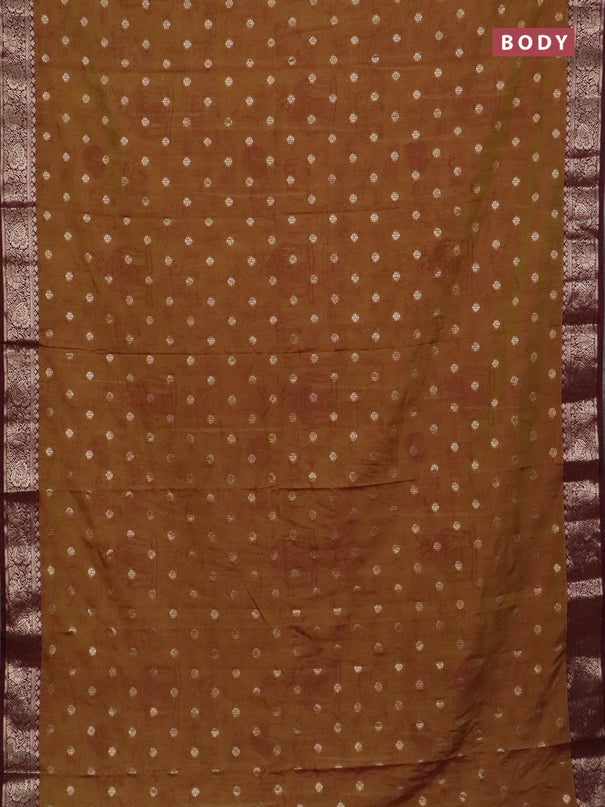 Semi raw silk saree dual shade of mustard green and wine shade with allover kalamkari prints & 1000 zari buttas and zari woven border