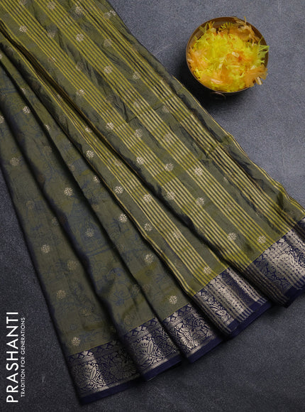 Semi raw silk saree mehendi green and navy blue with allover kalamkari prints & 1000 zari buttas and zari woven border