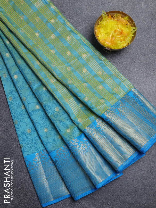Semi raw silk saree dual shade of teal blue and cs blue with allover prints & 1000 zari buttas and zari woven border