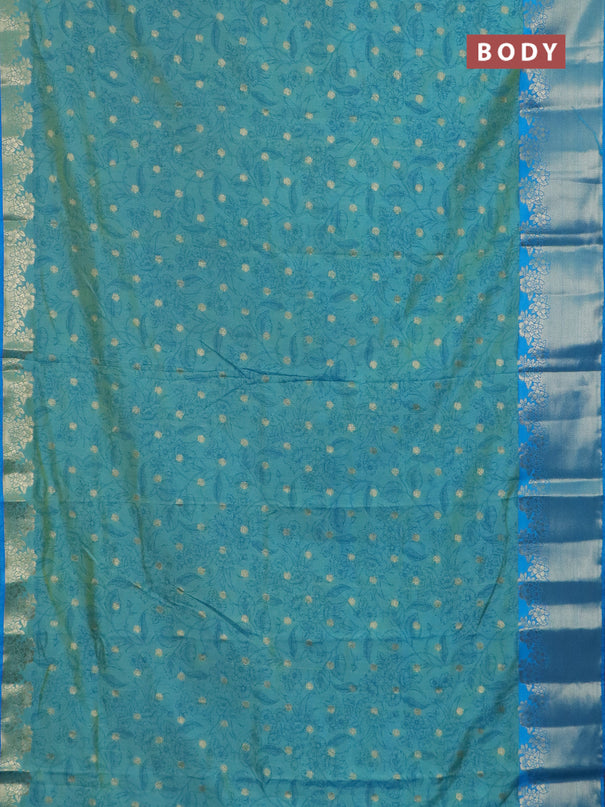 Semi raw silk saree dual shade of teal blue and cs blue with allover prints & 1000 zari buttas and zari woven border