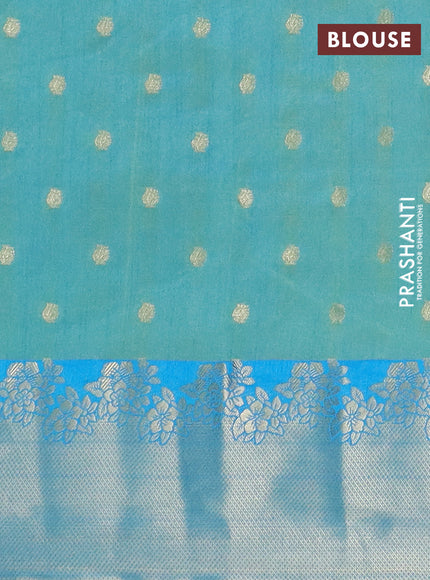Semi raw silk saree dual shade of teal blue and cs blue with allover prints & 1000 zari buttas and zari woven border