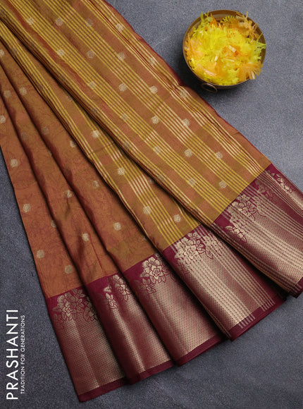 Semi raw silk saree dark mustard green and wine shade with allover prints & 1000 zari buttas and zari woven border