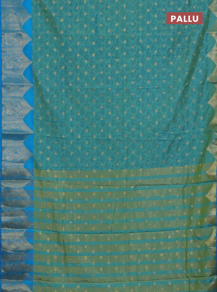 Semi raw silk saree dual shade of teal bluish green and cs blue with allover floral butta prints & 1000 zari buttas and zari woven border