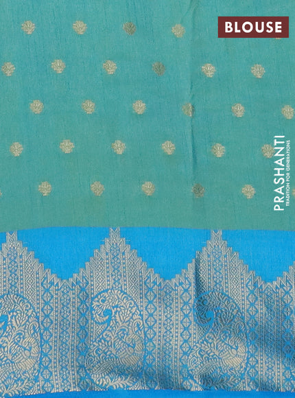 Semi raw silk saree dual shade of teal bluish green and cs blue with allover floral butta prints & 1000 zari buttas and zari woven border