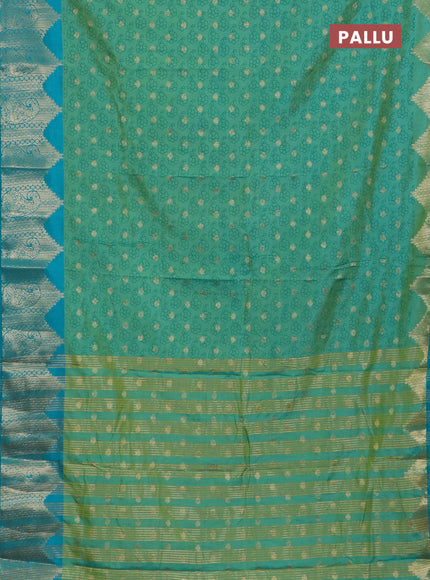 Semi raw silk saree dual shade of light greenish blue and teal blue with allover floral butta prints & 1000 zari buttas and zari woven border