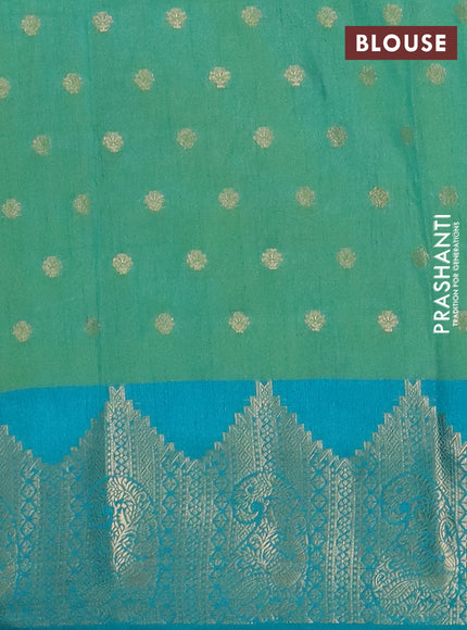 Semi raw silk saree dual shade of light greenish blue and teal blue with allover floral butta prints & 1000 zari buttas and zari woven border